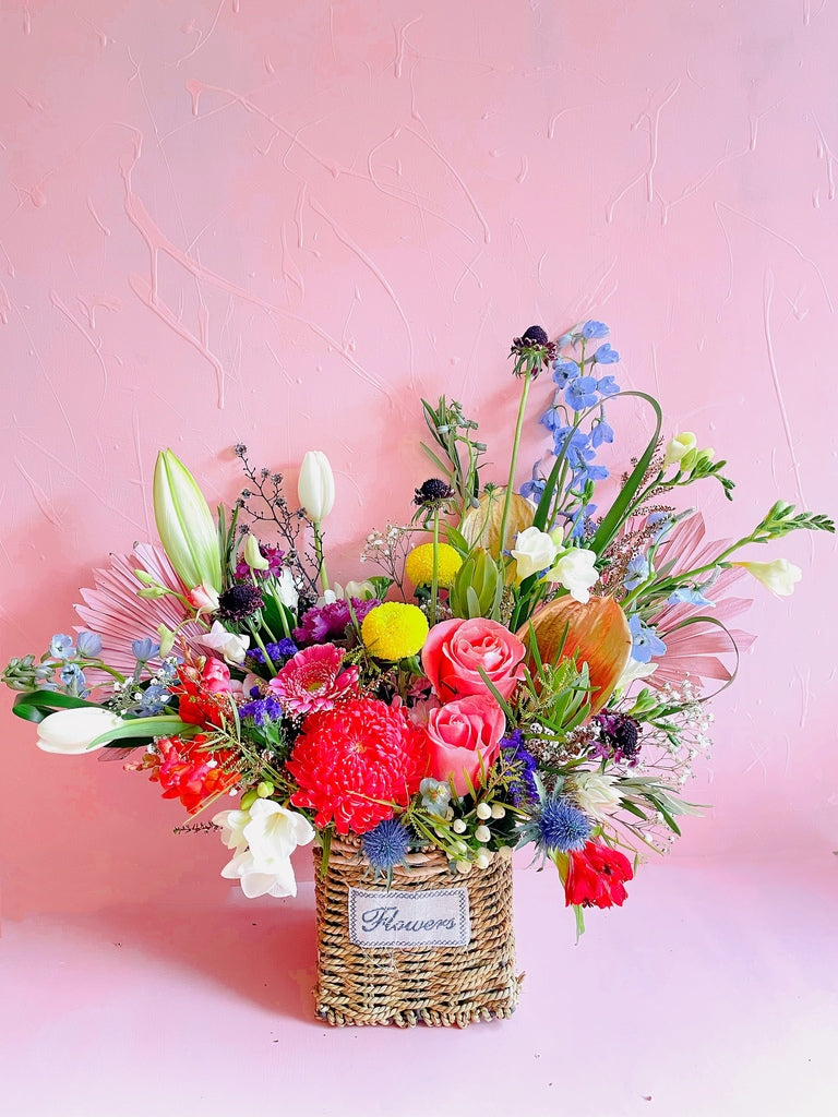 Fresh Flowers Arrangement In a Basket by florist canberra