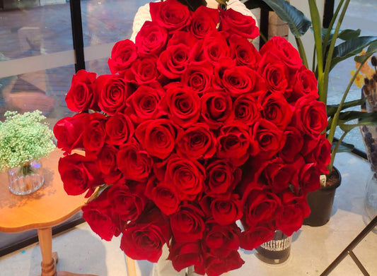 50 Stems of Ecuadorian Red roses in the Rosella flower shop
