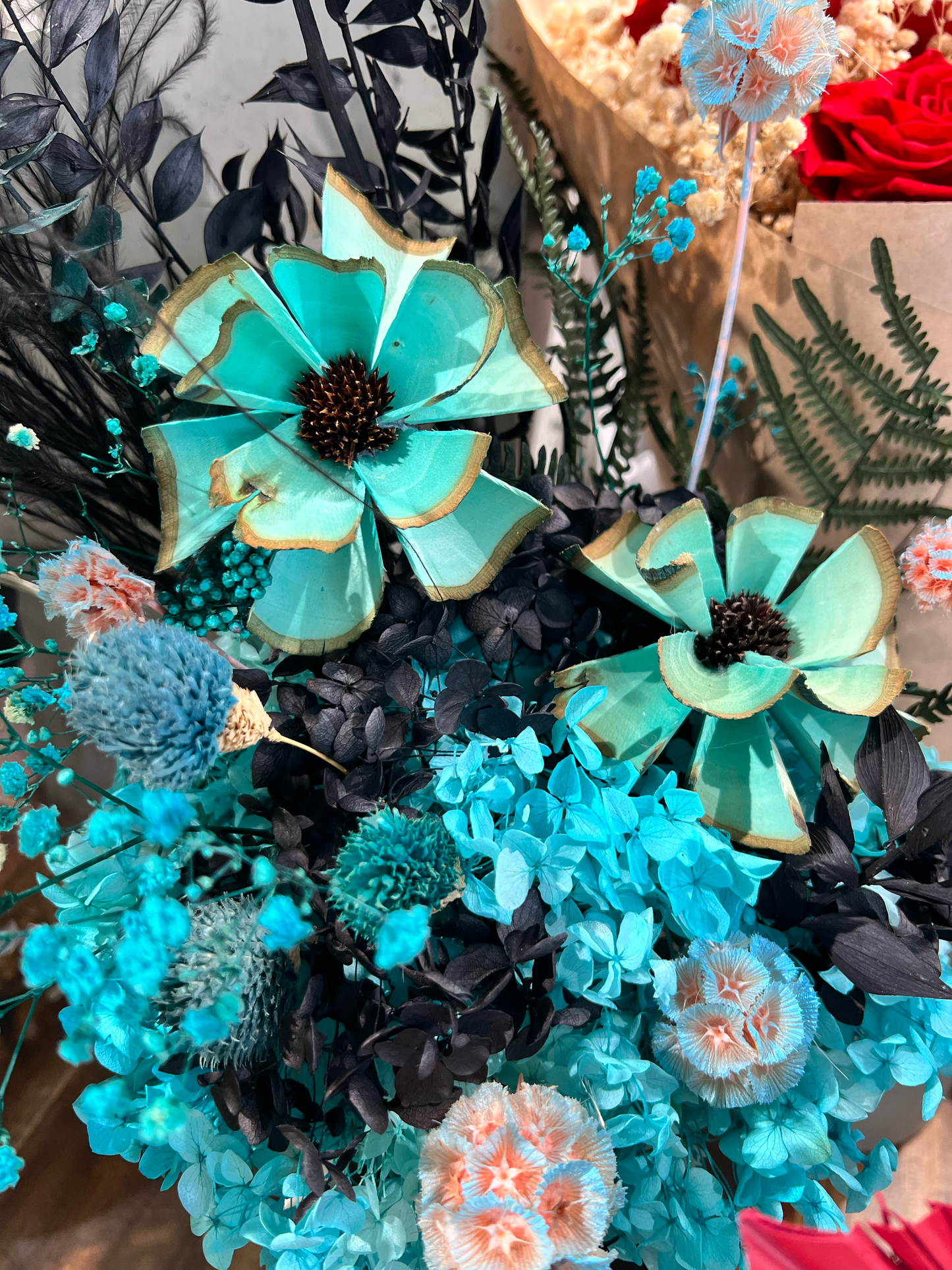 Preserved black and teal hydrangeas with unique dark preserved floral materials, showcasing premium everlasting flowers for modern floral design.