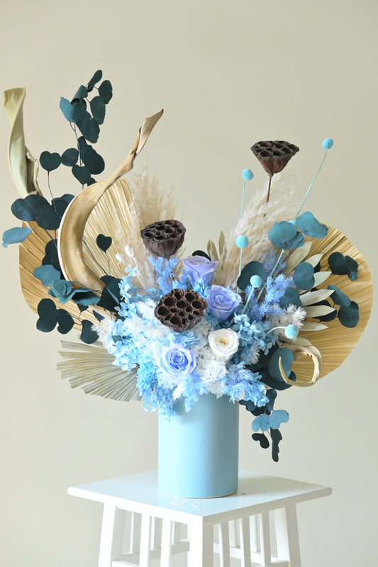 white and blue preserved bouquet